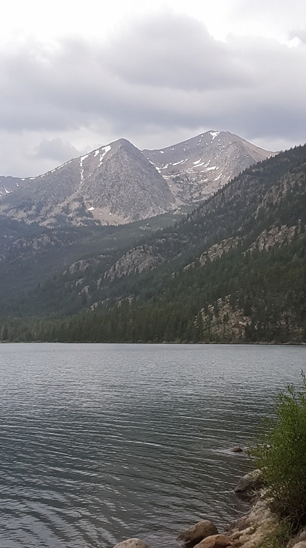 Hazy low-resolution landscape before AI enhancement