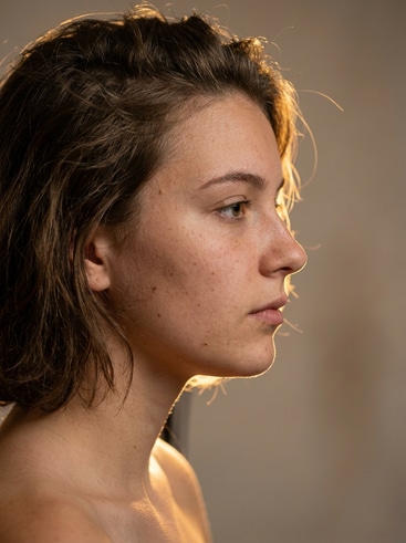 AI-generated side portrait of a modern teenage character
