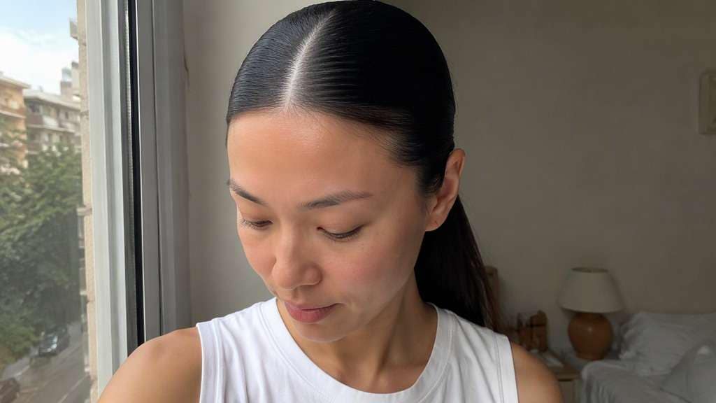 Middle Part Sleek Ponytail hairstyle