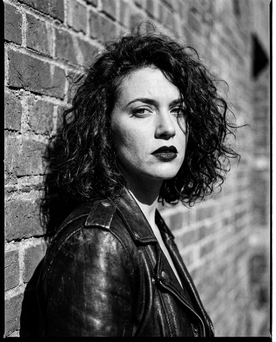 against brick wall frame photo