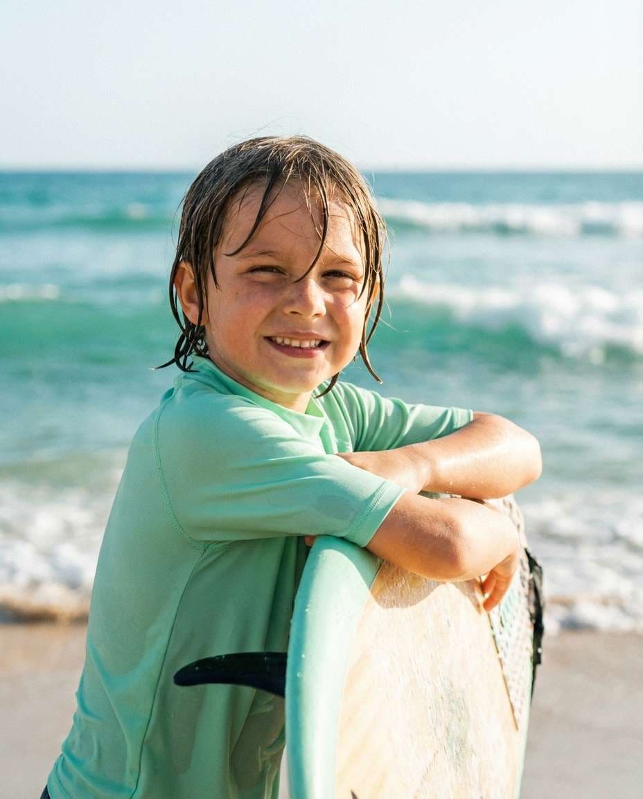 surfboard side hug photo