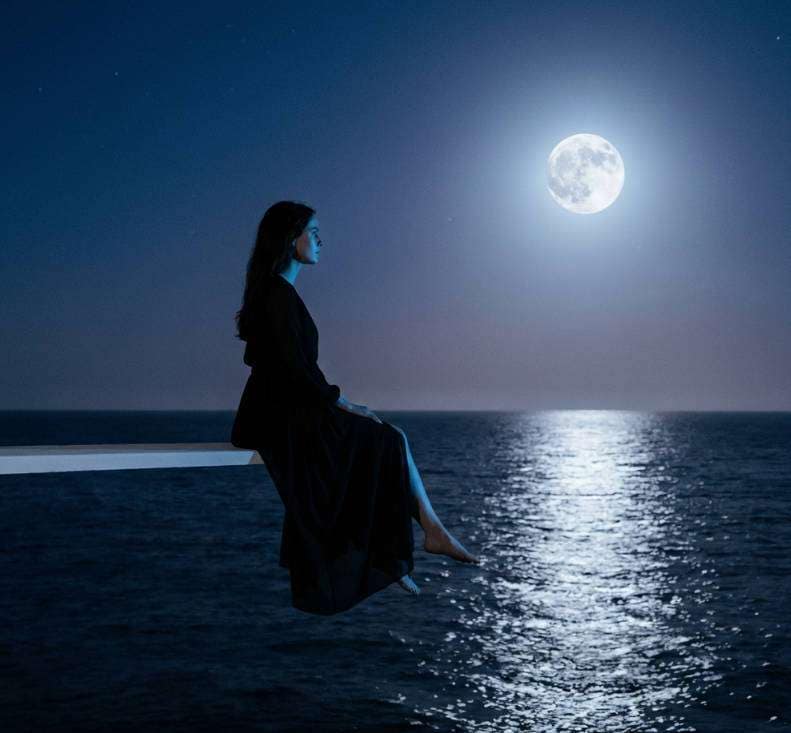 moonlit ocean diving scene