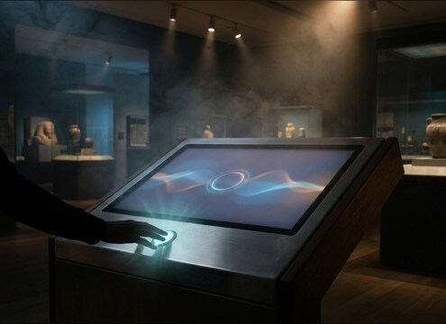 Museum touchscreen kiosk using a subtle right-buzzer confirm sound