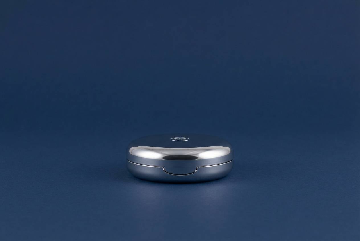 cosmetic compact on navy and silver
