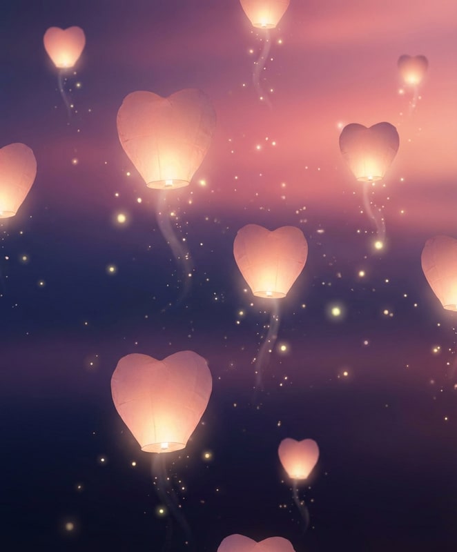 valentine screensaver - floating heart lanterns against twilight sky